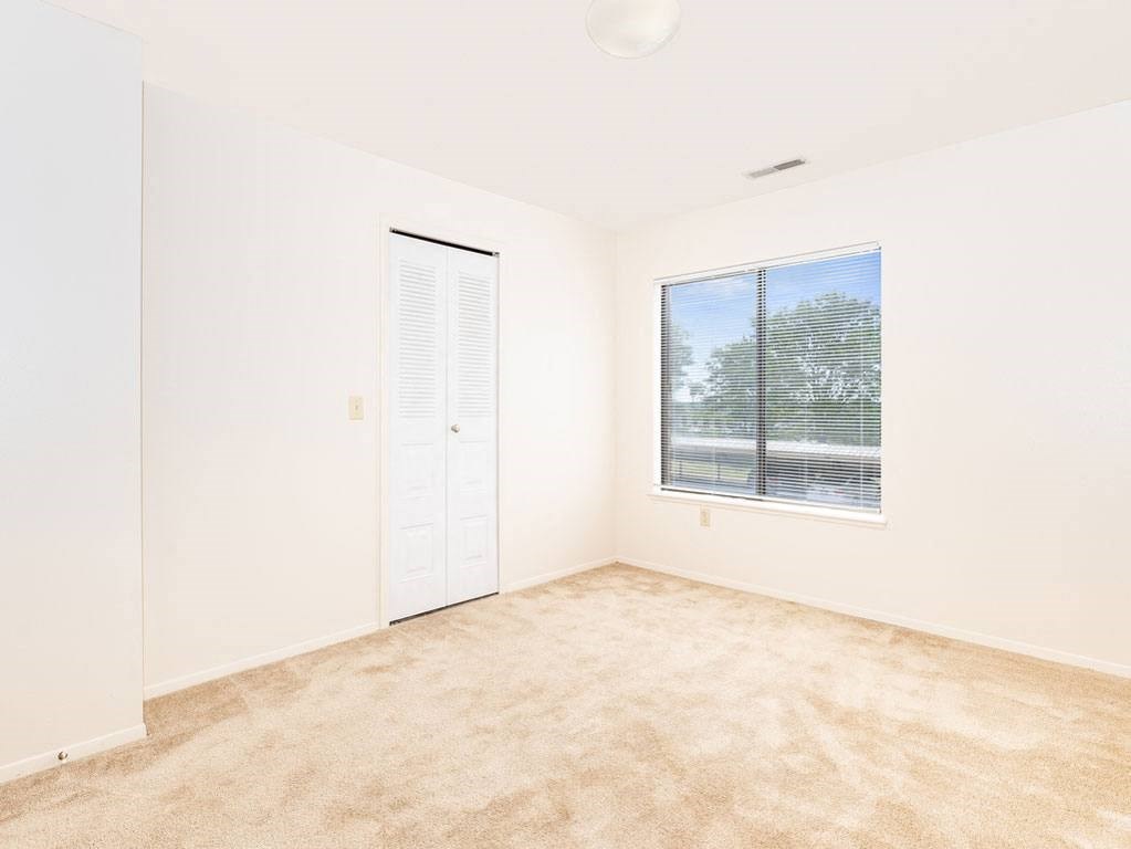 Spacious Bedroom with Large Closet at Oak Shores Apartments in Oak Creek, WI