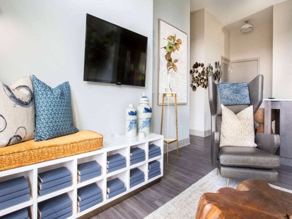 a living room with a couch and a tv  at Avant & Avant II, Carmel, IN, 46032