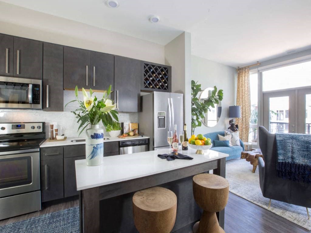 a kitchen or kitchenette at uptown city loft  at Avant & Avant II, Carmel, IN