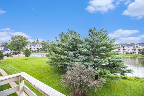 pond and pool view from private balcony at Pine Knoll Apartments, Battle Creek