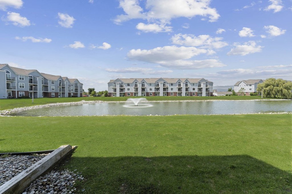 Private patio view of large pond at Hunters Pond Apartment Homes, Champaign, IL