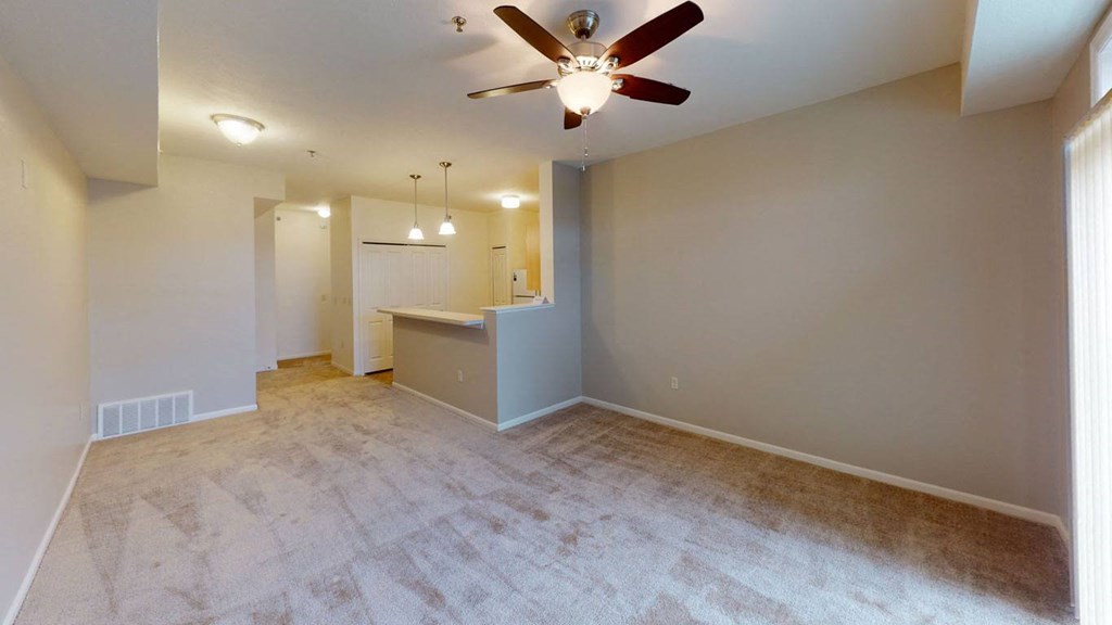 living room with a ceiling fan at Hunters Pond Apartment Homes, Champaign, IL