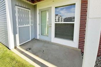 Patio or Balcony at Hunters Pond Apartment Homes in Champaign, Illinois