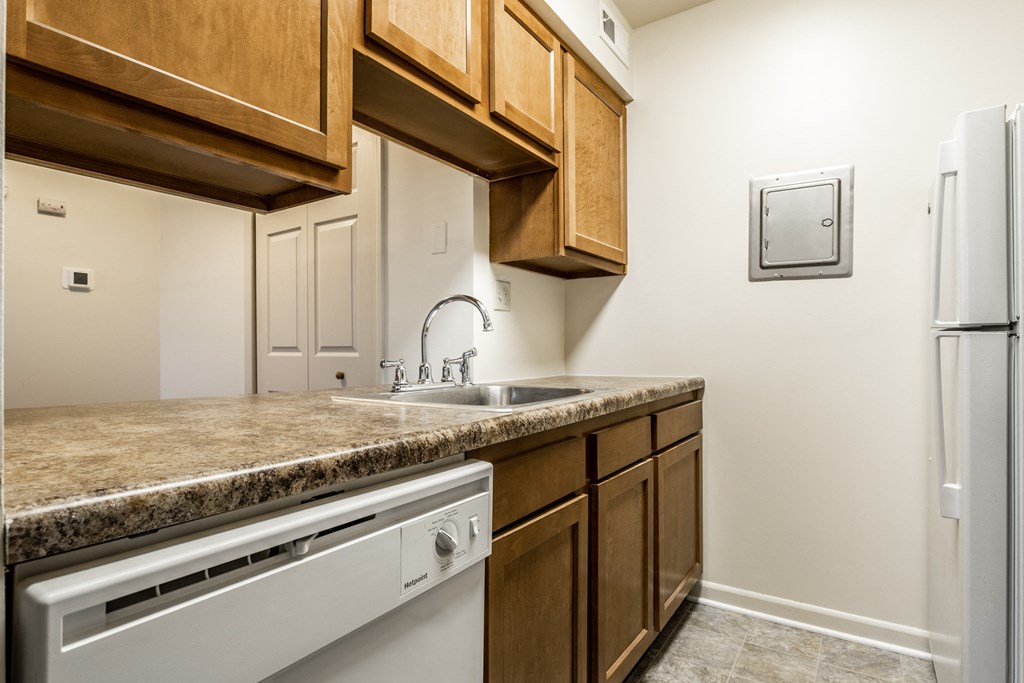 a kitchen with a sink and a dishwasher at Pheasant Run Apartments, Indiana, 47909