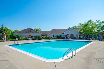 Refreshing Pool With Sundeck at Heatherwood Apartments in Grand Blanc, MI