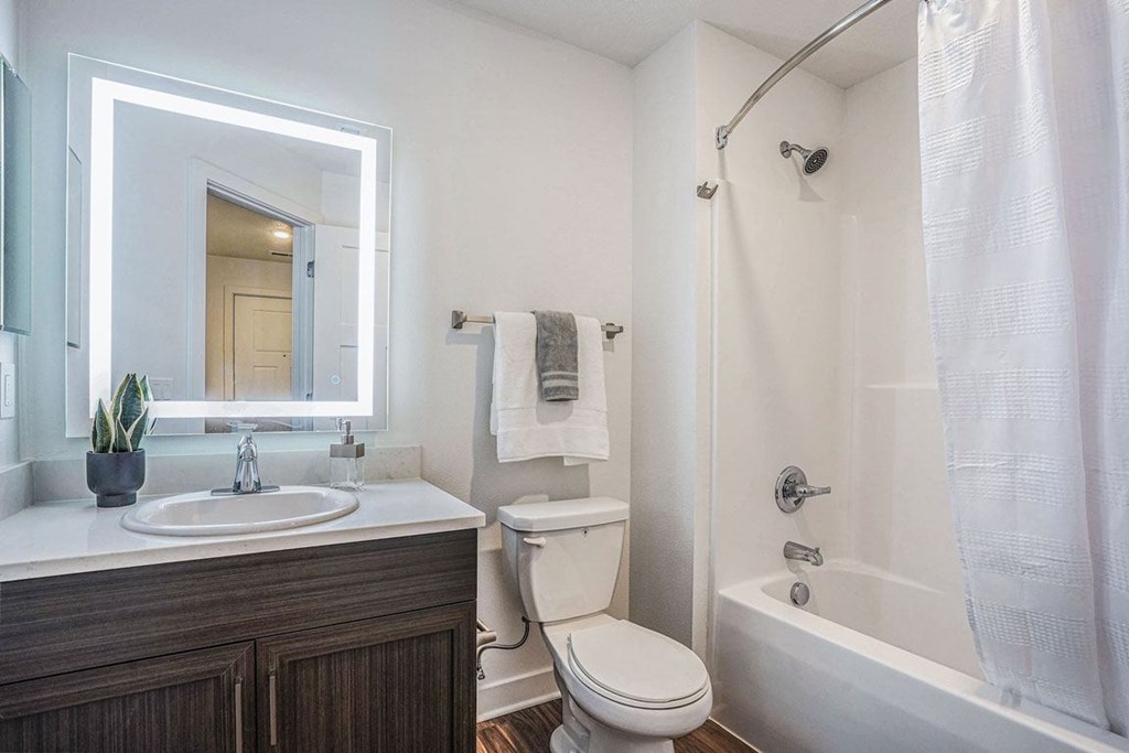 Master Bath with Hard-Surface Flooring at Meadowbrooke Apartment Homes in Grand Rapids, MI 49512