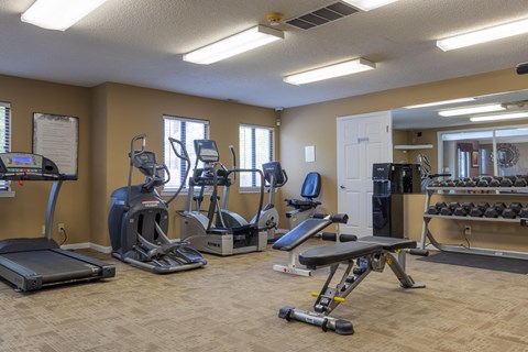 a gym with cardio machines and other exercise equipment at the village at vermilion