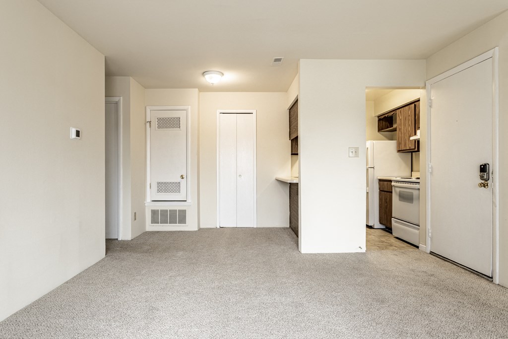 a renovated living room and kitchen in an apartment at Scarborough Lake Apartments, Indianapolis, 46254