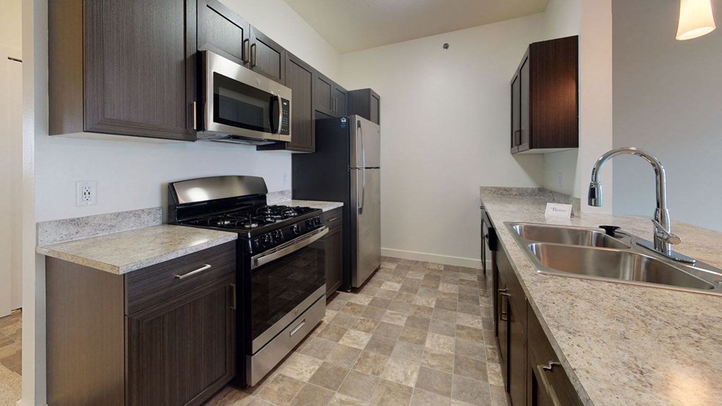 Two Bedroom Kitchen at The Reserve at Destination Pointe in Grimes, IA with