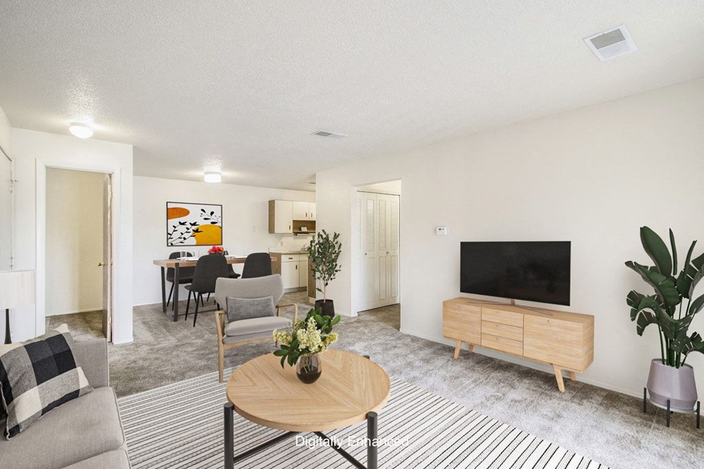 a living room and dining room at Seville Apartments, Kalamazoo, MI, 49009