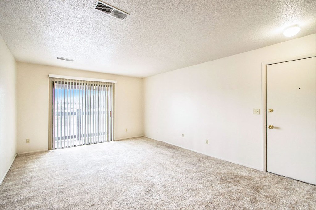 Carpeted Living Room at Seville Apartments, Michigan