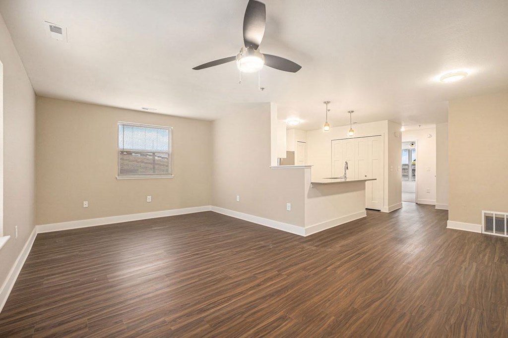 enlarged living room with a hard surface flooring at Stoney Pointe Apartment Homes, Wichita