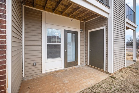 Patio with a door to enclosed storage  at Signature Pointe Apartment Homes, Athens, AL, 35611
