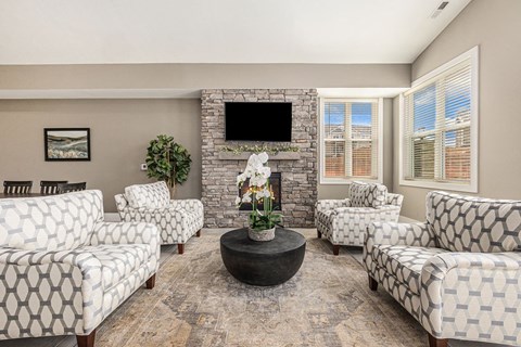 Community Building with fireplace  at Signature Pointe Apartment Homes, Alabama