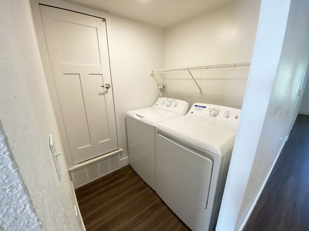 Separate Laundry Room at Stoney Pointe Apartment Homes in Wichita, KS