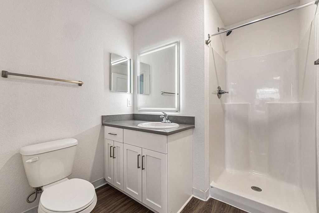 a bathroom with a sink toilet and a shower at Stoney Pointe Apartment Homes, Wichita, KS, 67226