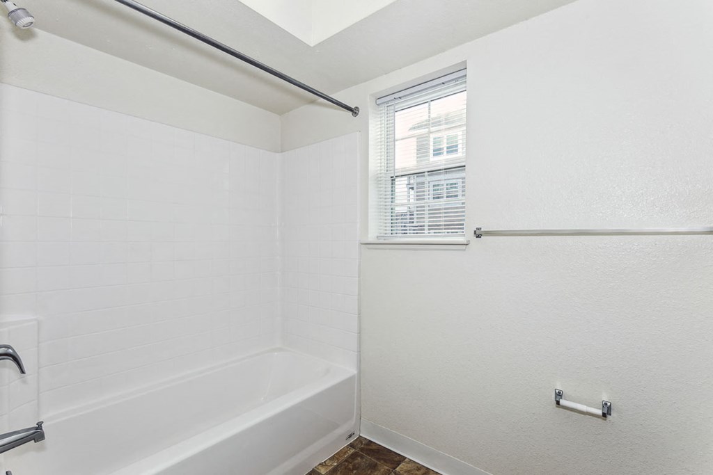 Large Bathroom  with Tub/Shower Combination at Stoney Pointe Apartment Homes in Wichita, KS