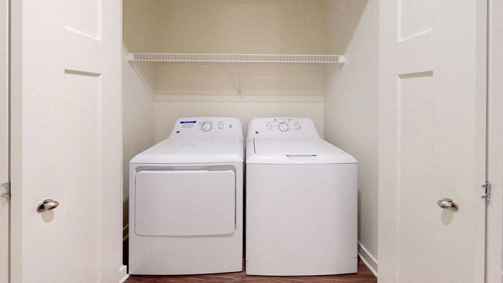a washer and dryer in the laundry room at Strathmore Apartment Homes, West Des Moines, 50266