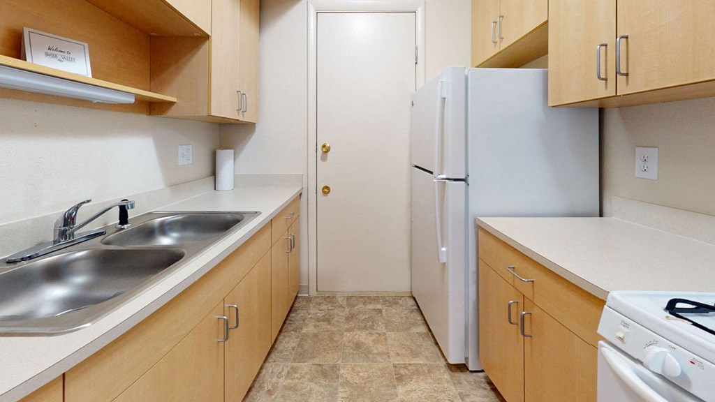 Kitchen with Maple Cabinetry at Swiss Valley Apartments, Wyoming