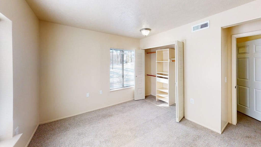 Bedroom With Adequate Storage at Swiss Valley Apartments, Michigan