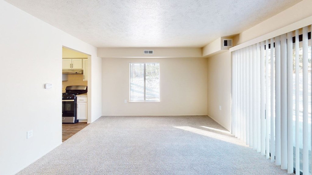 large luxury apartment living room with large windows at Swiss Valley Apartments, Wyoming, Michigan