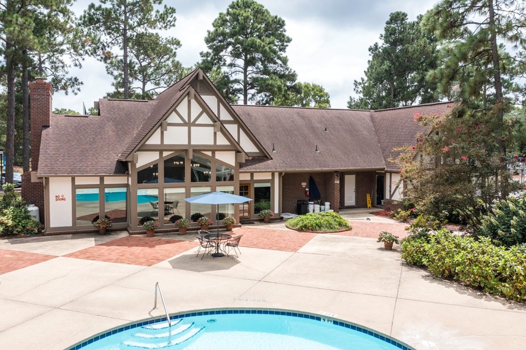 A house with a pool in the backyard.