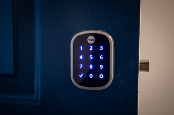 a blue door handle with a digital clock on it at Beacon Hill and Great Oaks Apartments, Illinois