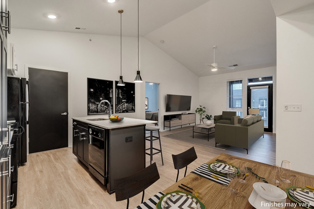 a view of the kitchen and living room from the dining area  at Uptown Square Apartments, Troy, MI