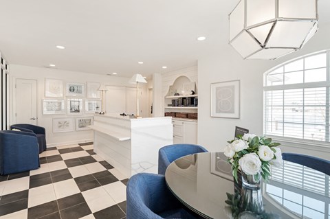 A black and white checkered floor in a well lit room. at Sundance Apartments, Indianapolis, Indiana