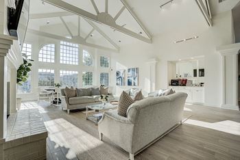 A living room with a couch and a television. at Sunscape Apartments, Roanoke, Virginia