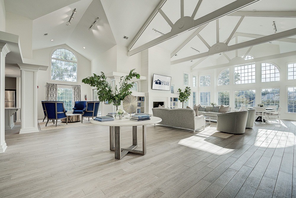 A spacious living room with a large table and chairs. at Sunscape Apartments, Roanoke, VA, 24018