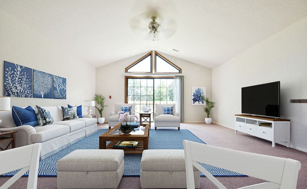 Living Room with Cathedral Ceiling at Tanglewood Apartments in Oak Creek, WI