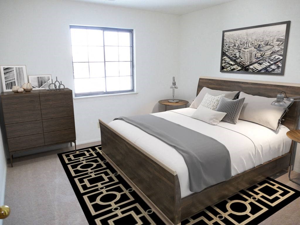 Bedroom with Plush Carpeting at Tanglewood Apartments, Wisconsin 53154