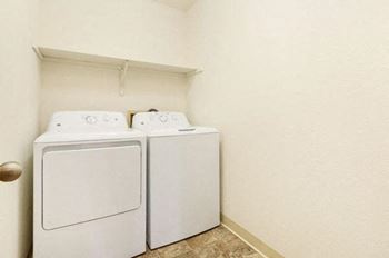 a full-size washer and a dryer at Tanglewood Apartments, Wisconsin, 53154