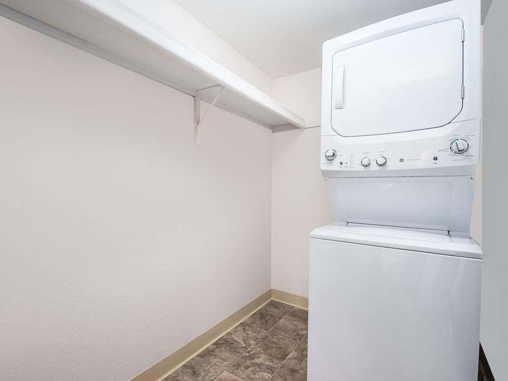 a stackable washer and dryer at Tanglewood Apartments, Wisconsin, 53154
