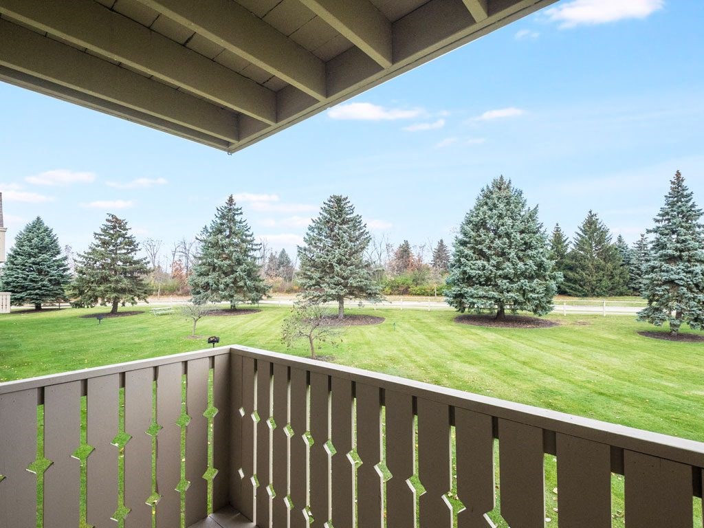 a view of the park-like grounds from the balcony of a house at Tanglewood Apartments, Oak Creek, Wisconsin