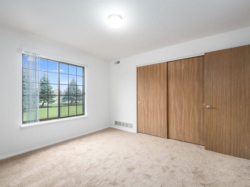 Bedroom with large closet at Tanglewood Apartments, Oak Creek, 53154