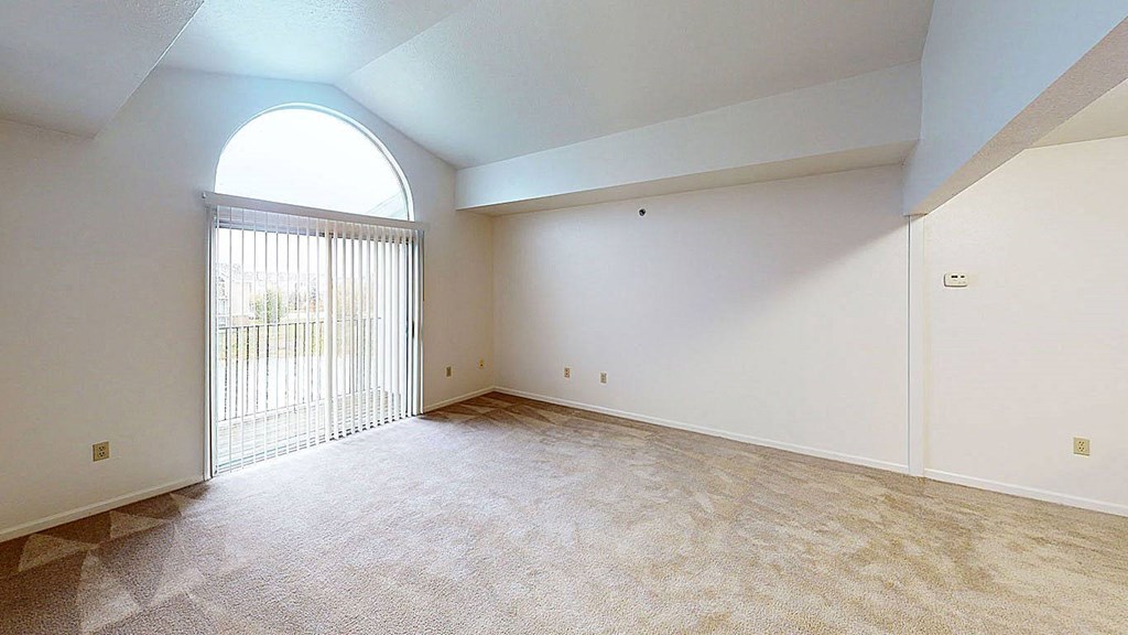 two bedroom living room with a cathedral ceiling  at Tracy Creek Apartment Homes, Perrysburg