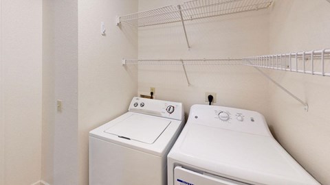 a washer at Tracy Creek Apartment Homes, Perrysburg, OH, 43551