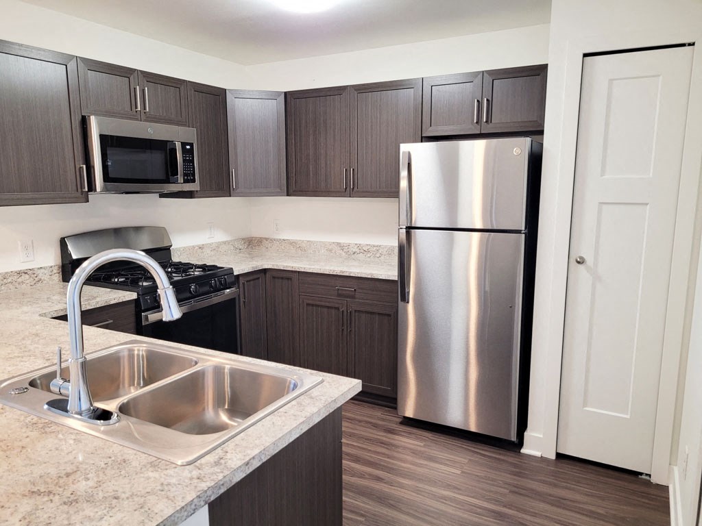 One Bedroom Modern Kitchen with Pantry at Trade Winds Apartment Homes, Elkhorn, NE