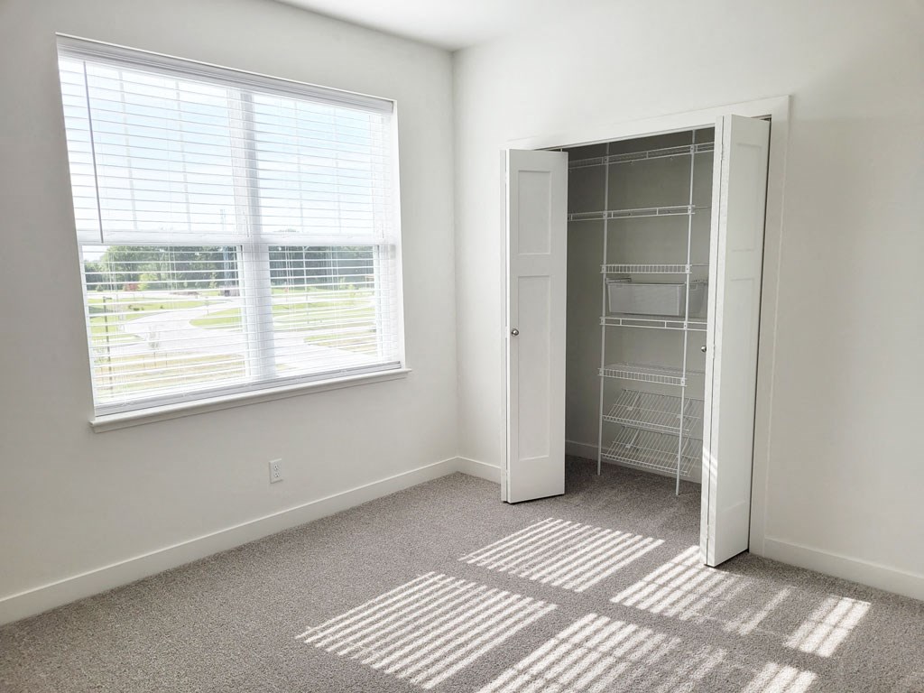 Bedroom with Large Windows with Lots of Natural Light at Trade Winds Apartment Homes, Elkhorn, NE
