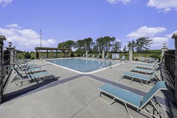 Swimming Pool with Large Sundeck at Trade Winds Apartment Homes in Elkhorn, NE