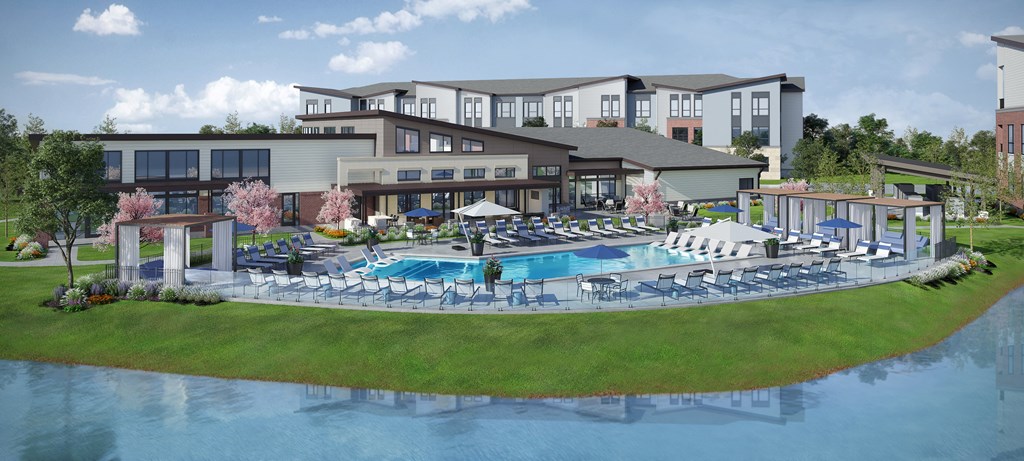 Resort Style with Aqua Ledges, Gazebos, & Lounge Chairs. Located Behind the Clubhouse. Pool Bordered By  Scenic Lake View Apartment Home at Upper Vue Flats.