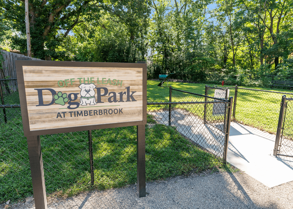 A sign for Dog Park at Timberbrook is shown.