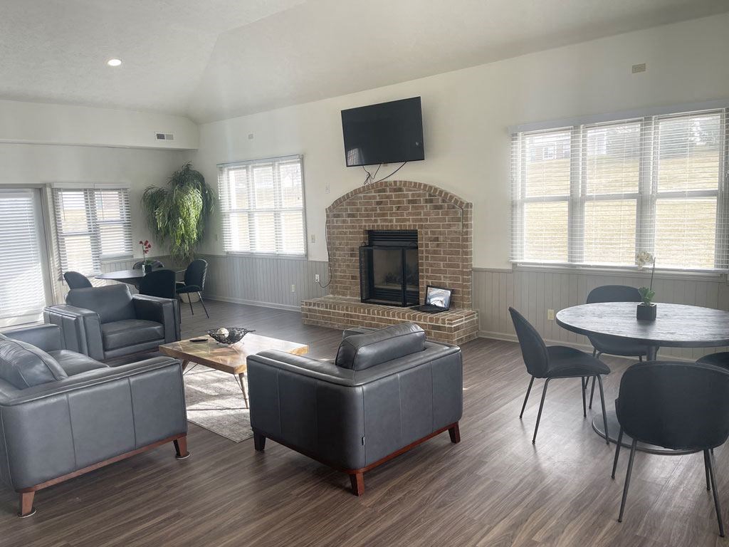 Community building with a fireplace at West Hampton Park Apartments in Elkhorn, NE 68022