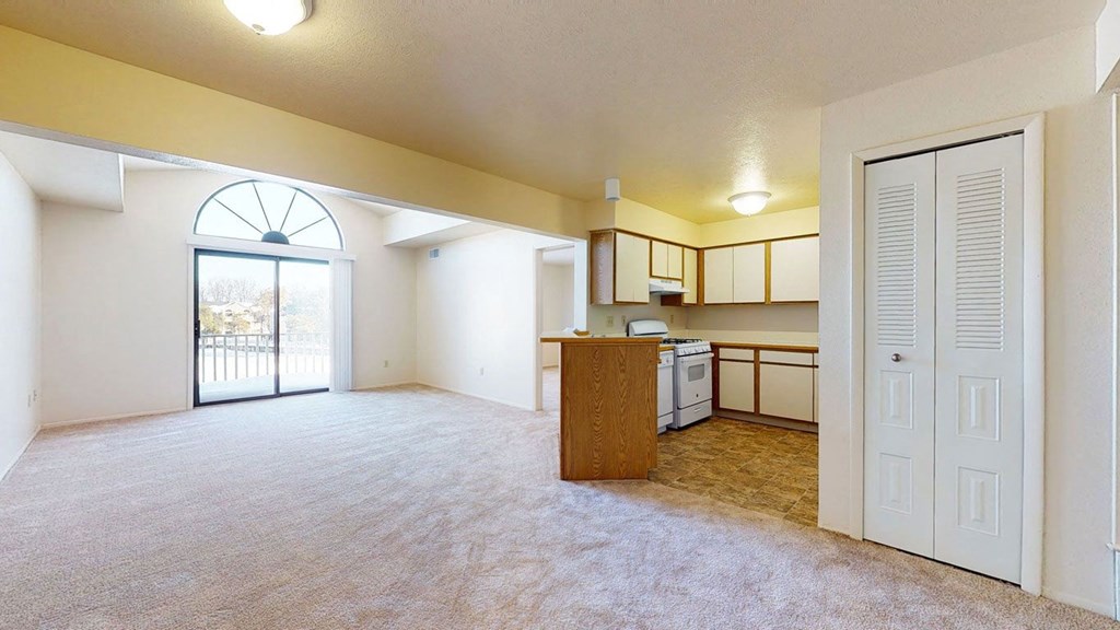 Two bedroom one bath living room with cathedral ceiling