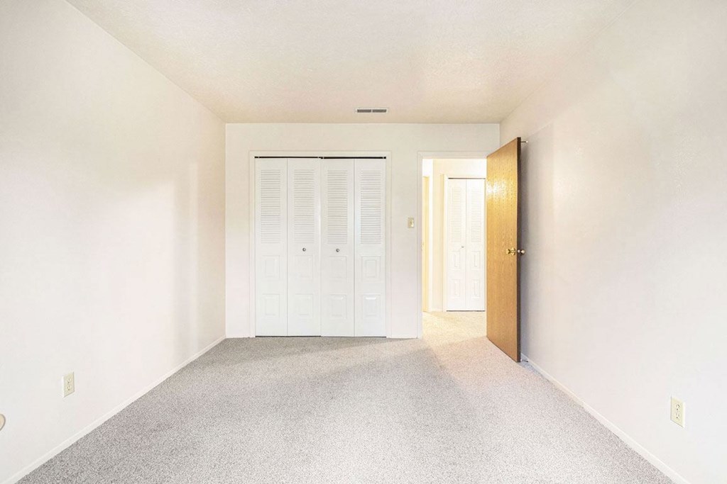 bedroom with large closet at Wingate Apartments, Kentwood