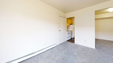 Living/Dining Areas with breakfast bar  at Wood Creek Apartments, Kenosha
