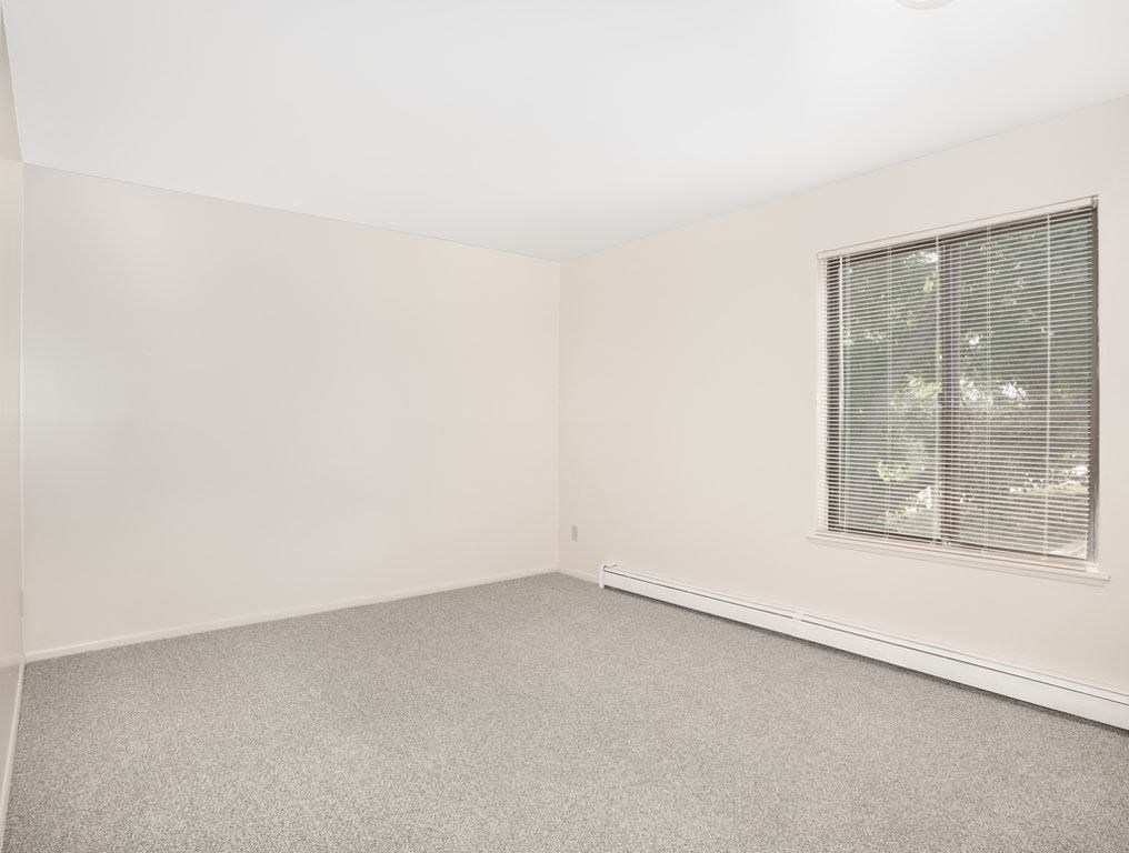 Second Spacious Bedroom Private Balcony at Wood Creek Apartments in Kenosha, WI