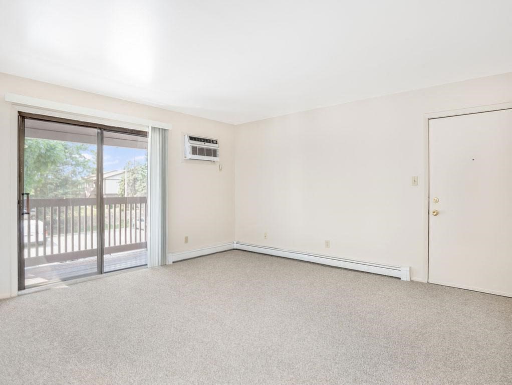 Slider to Private Balcony Private Balcony at Wood Creek Apartments in Kenosha, WI